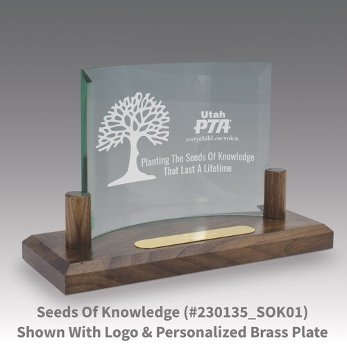 curved glass base award with seeds of knowledge message