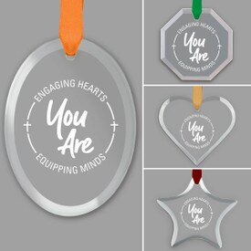 different shapes of crystal ornament with engaging hearts equipping minds message and satin ribbon
