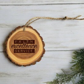 wooden ornament with faith excellence service message