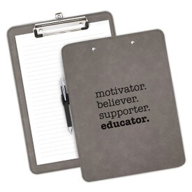 9"w x 12.5"h Richly Textured Clipboard Featuring The Inspirational Message: Motivator Believer Supporter Educator. Available In 5 Colors. 